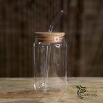 Glass cup with straw